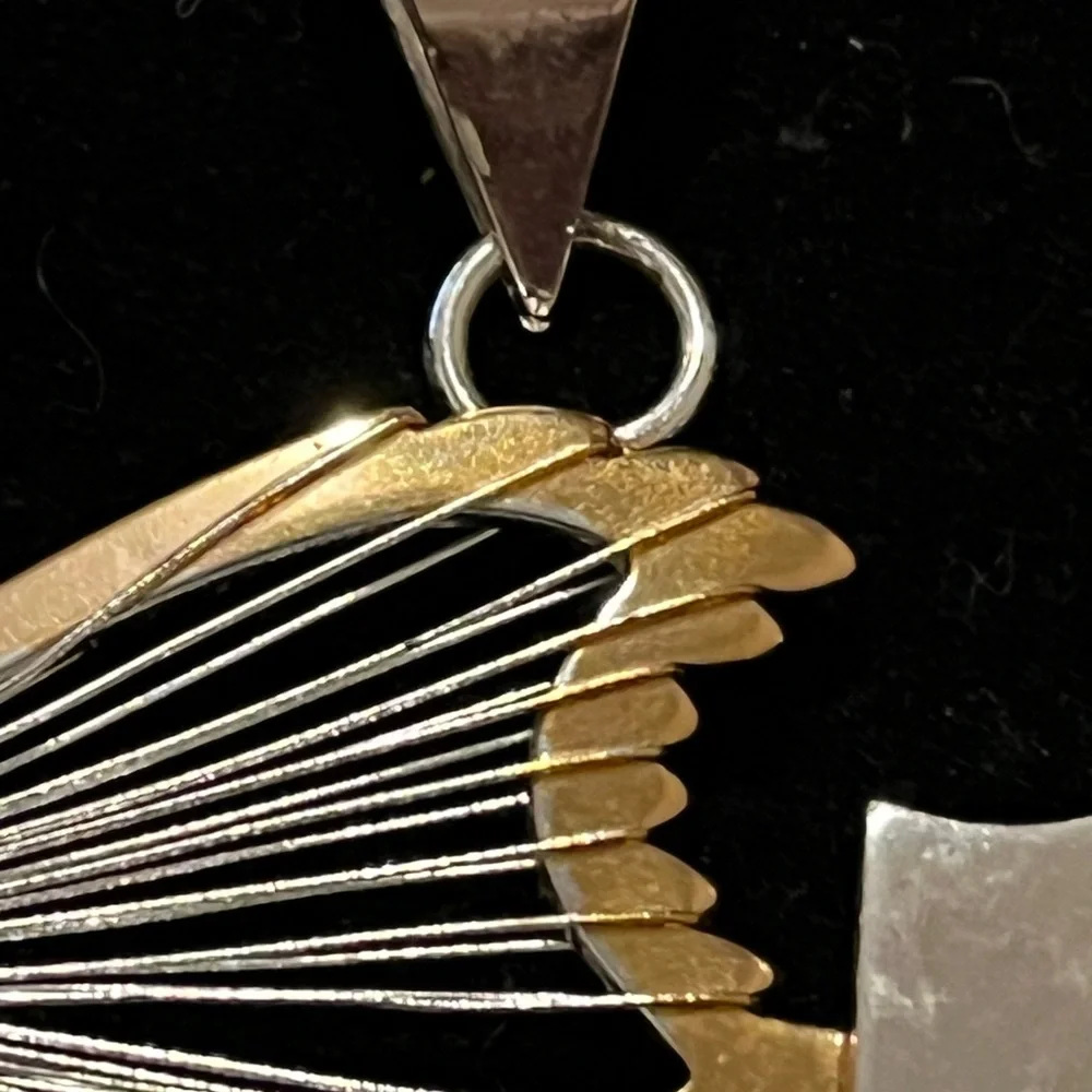 Elegant BEST Silver and Gold Fish Pendant